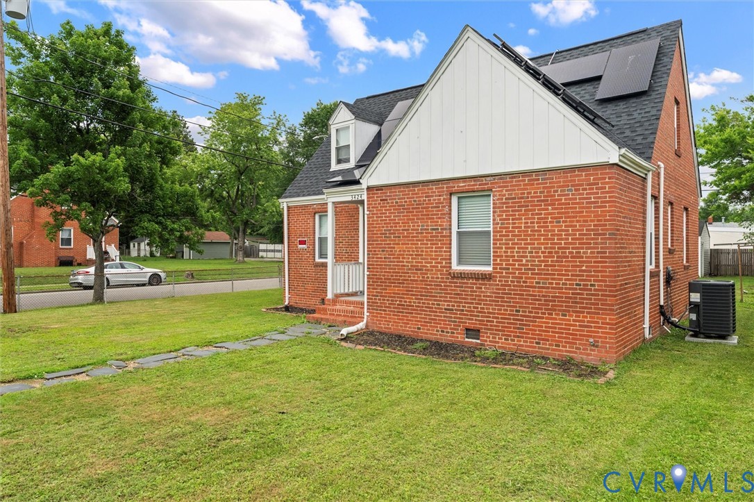 3424 Danbury Road Richmond, VA 23234 - Photo 37 of 37 Rear view of property featuring brick siding, roof