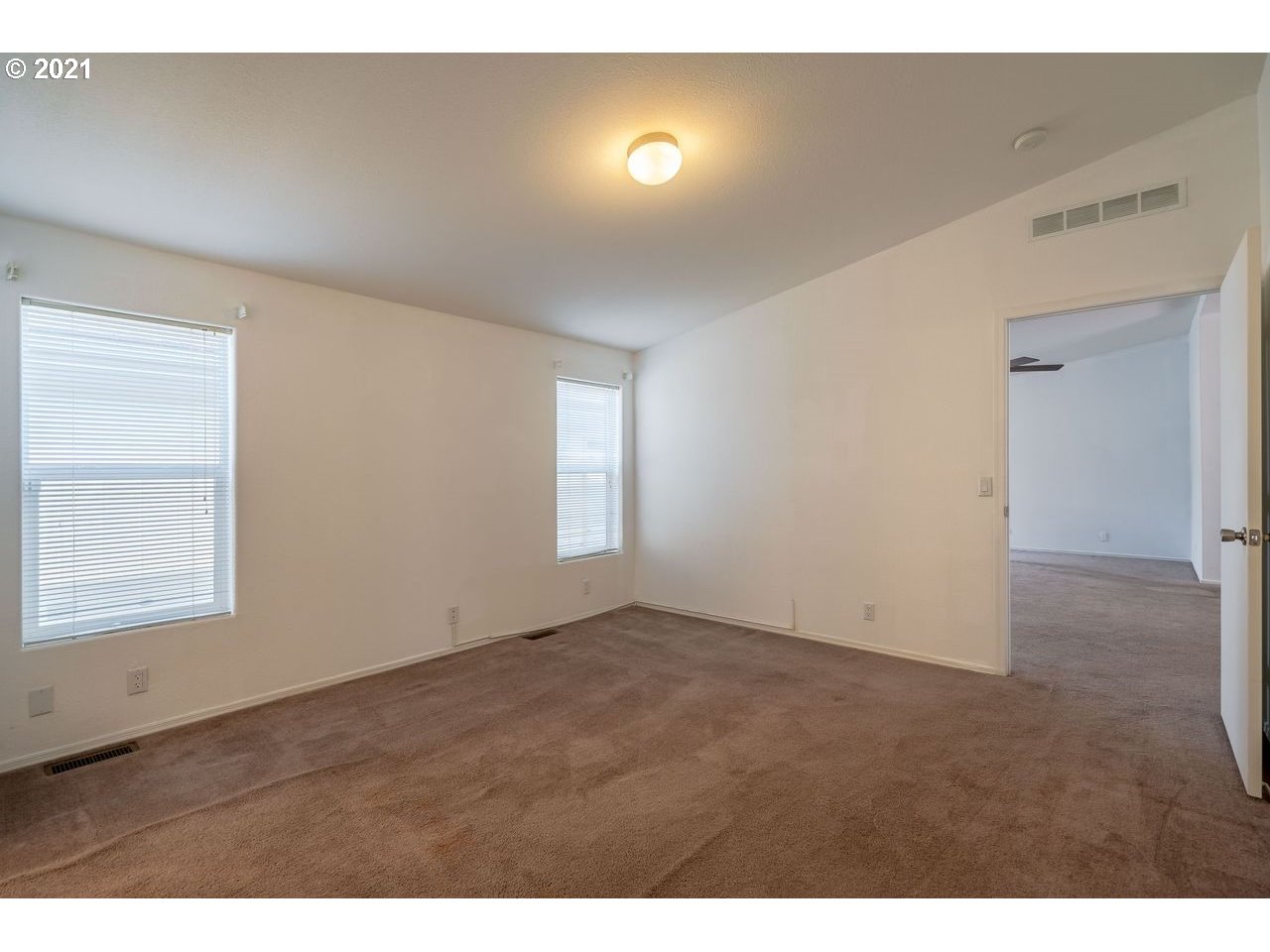 2525 Maia Loop Springfield, OR 97477 - Photo 14 of 27 a view of an empty room with a window