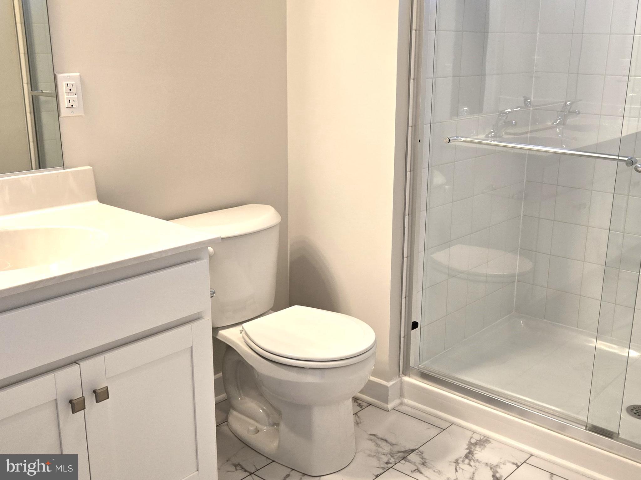 123 Case Road Townsend, DE 19734 - Photo 12 of 22 a bathroom with a toilet and a shower