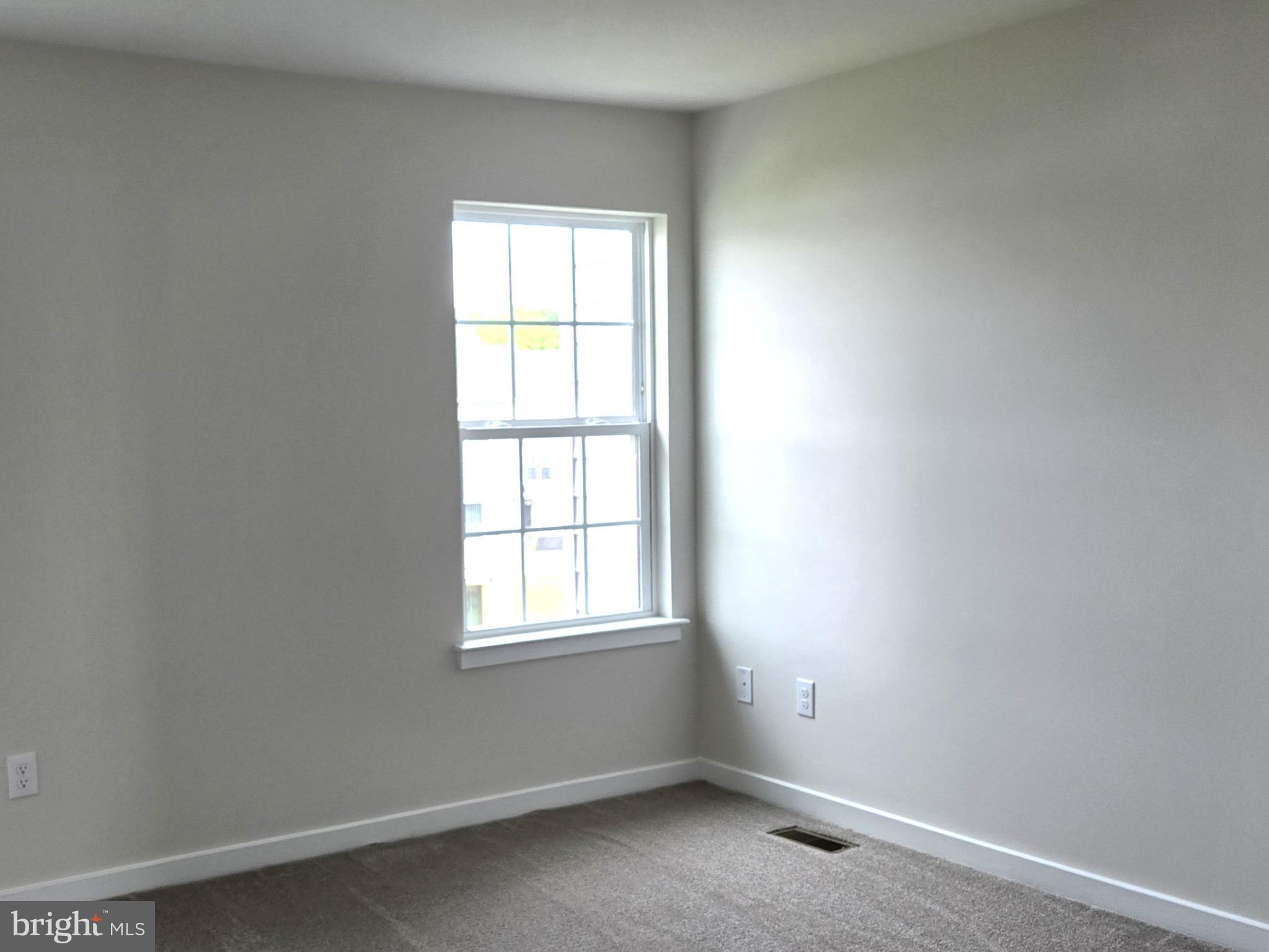 123 Case Road Townsend, DE 19734 - Photo 15 of 22 an empty room with windows