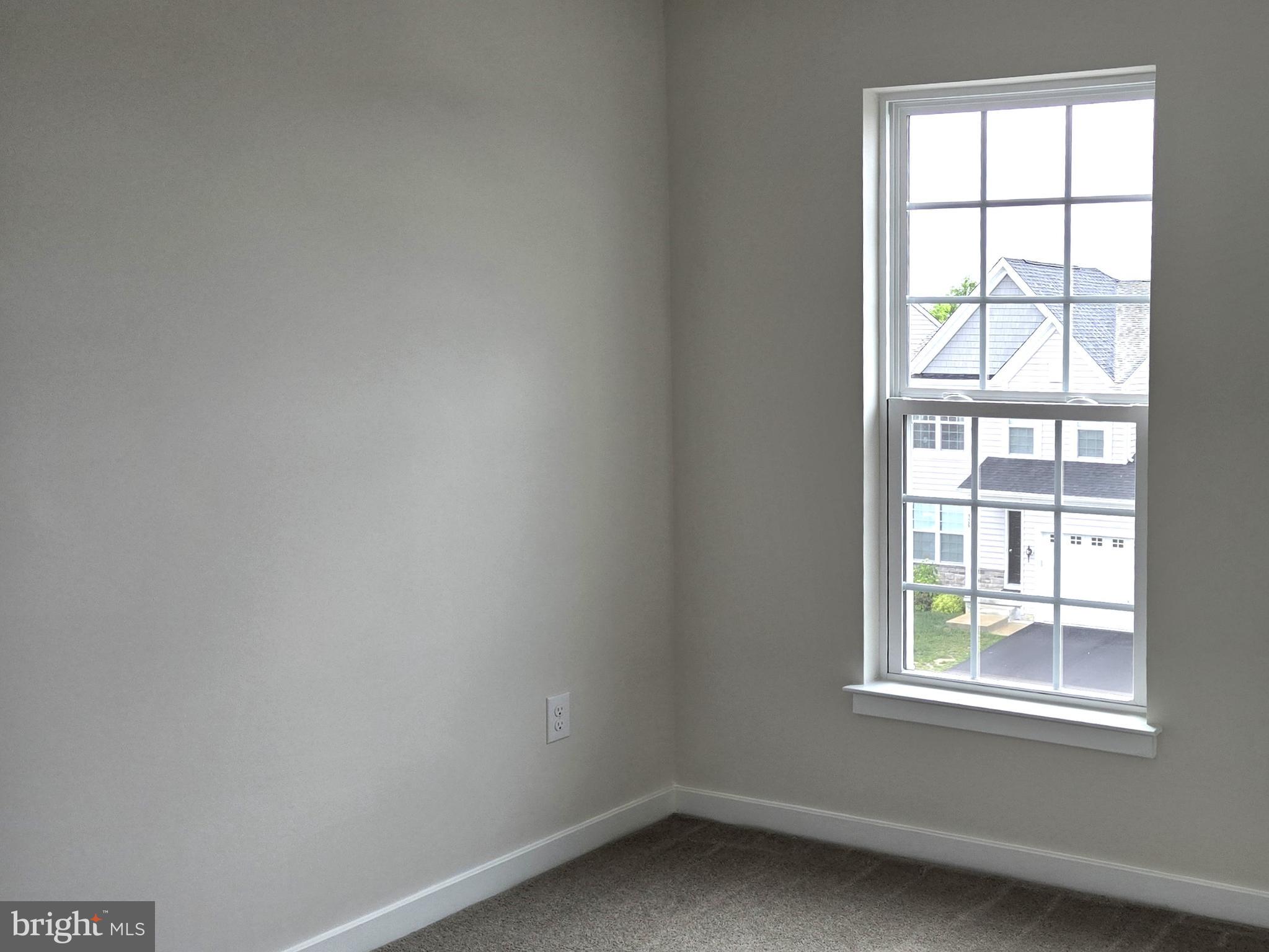 123 Case Road Townsend, DE 19734 - Photo 18 of 22 an empty room with a window