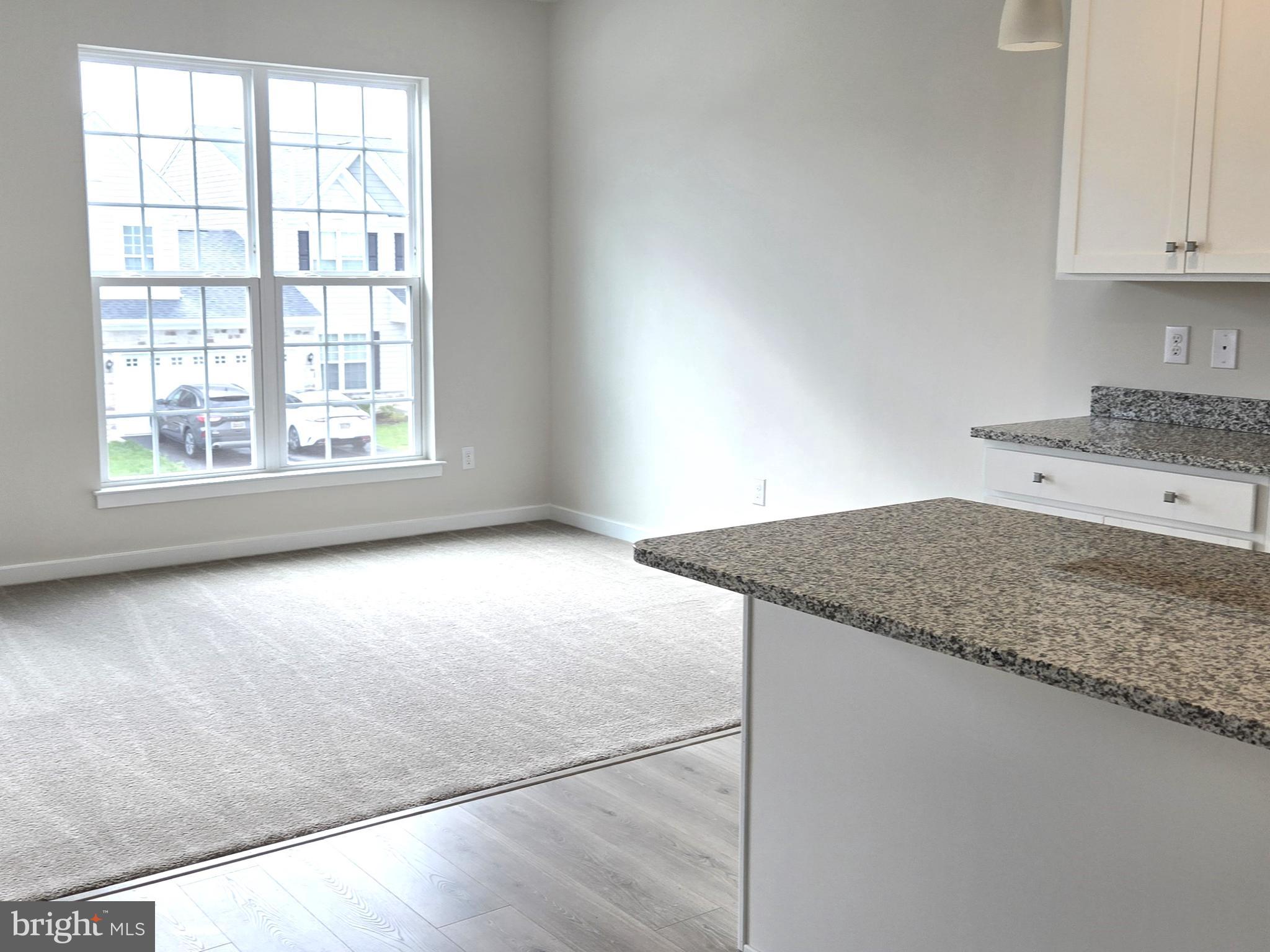 123 Case Road Townsend, DE 19734 - Photo 9 of 22 a view of a kitchen with granite countertop cabinets and a sink