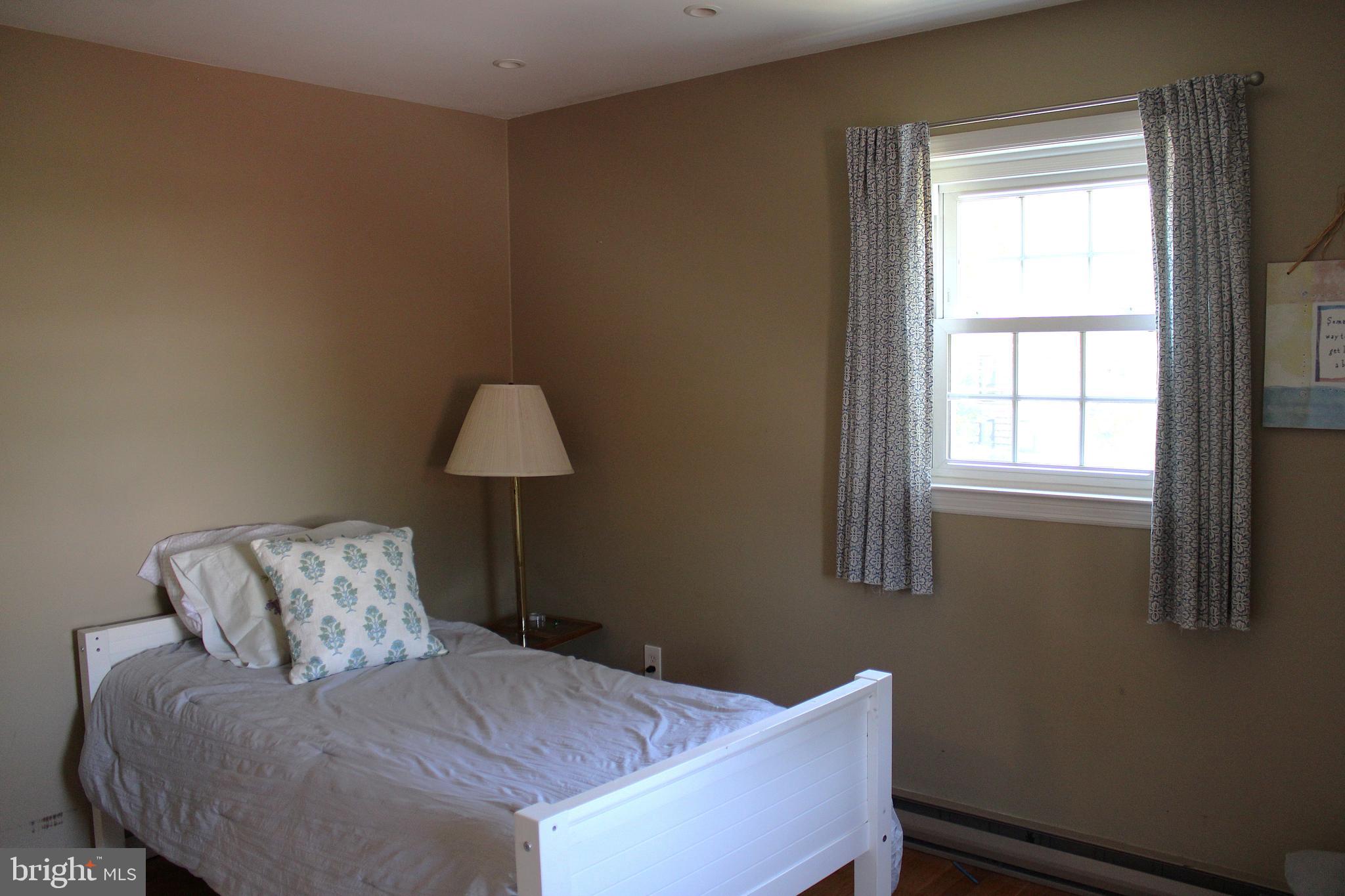 1385 North Brookside Road Allentown, PA 18106 - Photo 12 of 18 a bed room with a bed and a window