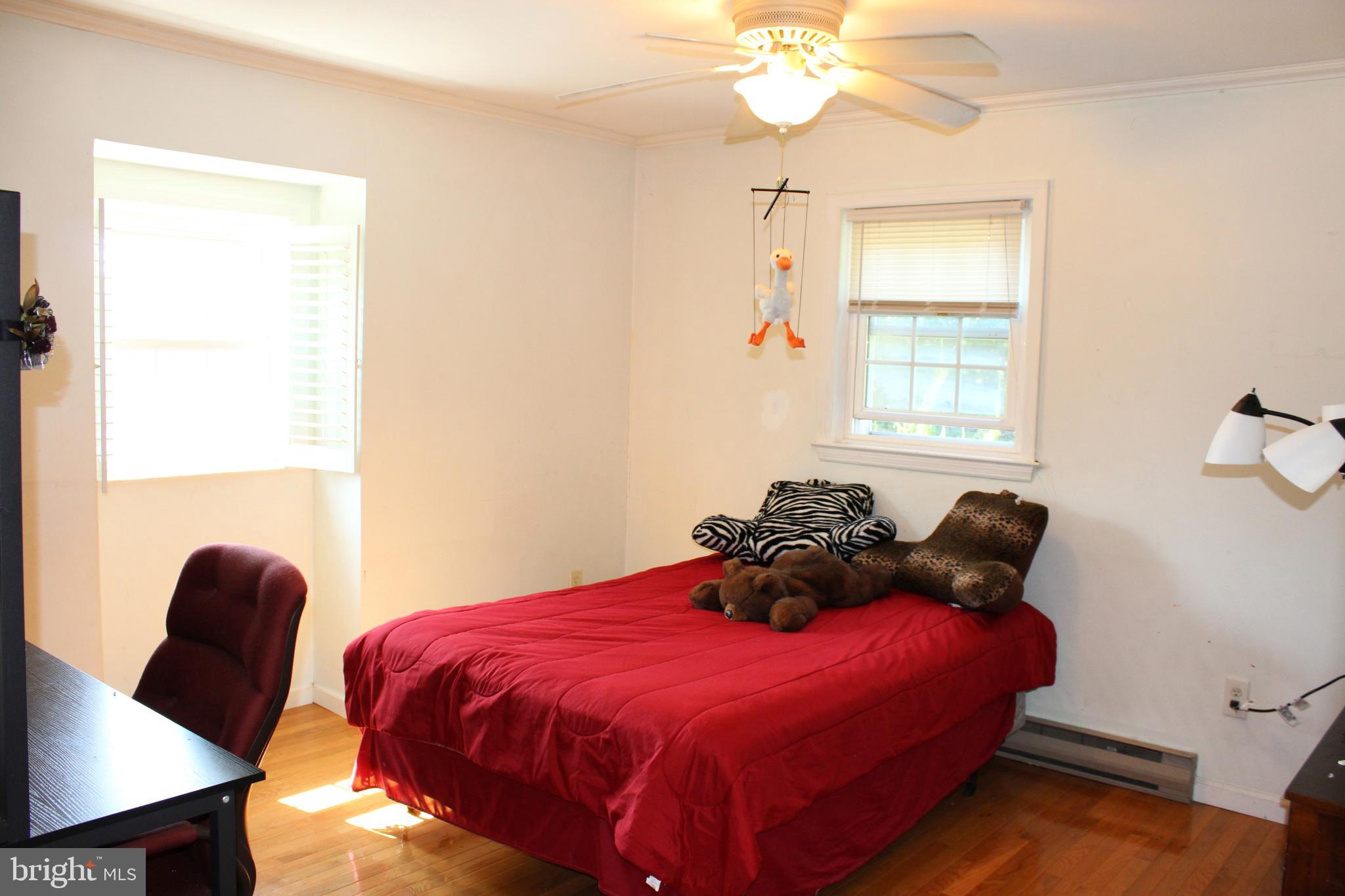 1385 North Brookside Road Allentown, PA 18106 - Photo 13 of 18 a bedroom with a bed and a window