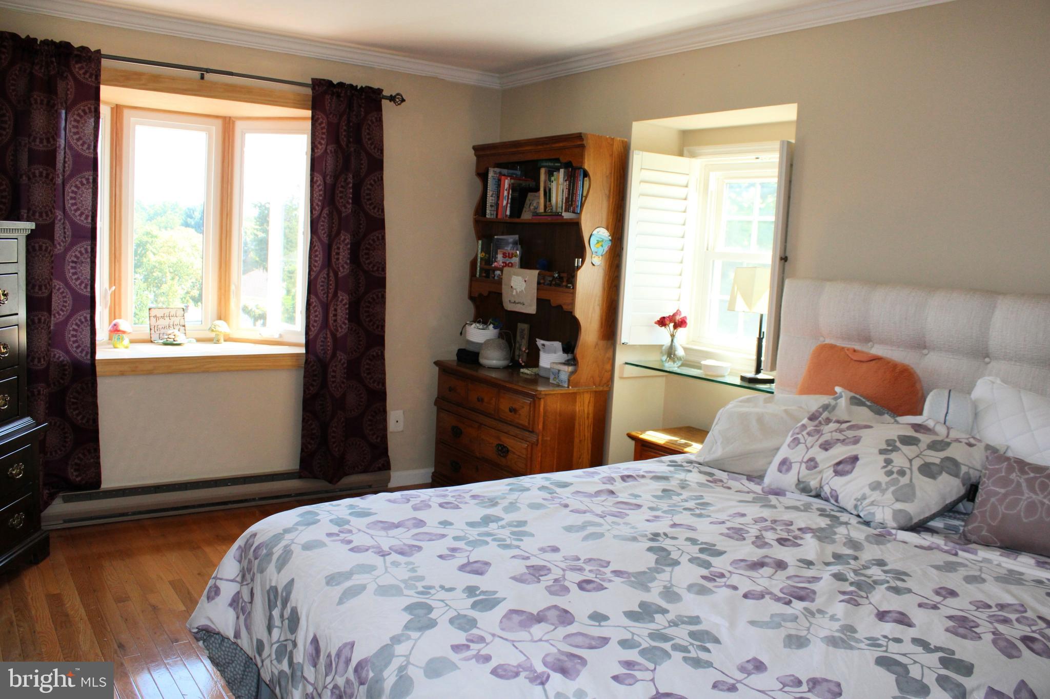 1385 North Brookside Road Allentown, PA 18106 - Photo 14 of 18 a bedroom with a bed and a window