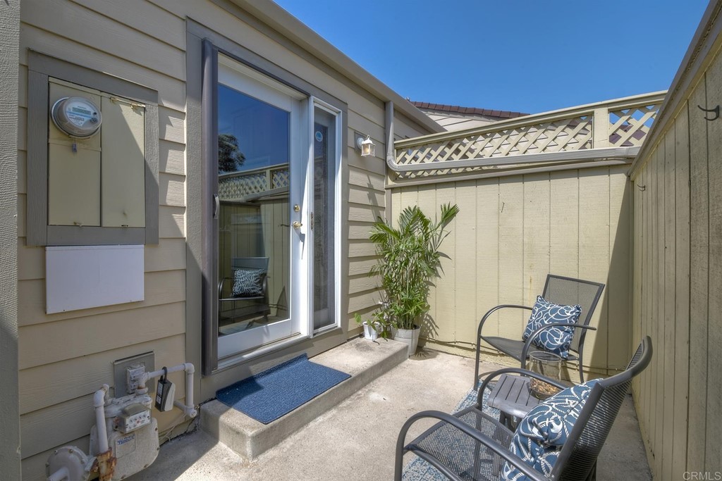 1808 Parliament Road Encinitas, CA 92024 - Photo 12 of 49 The front patio has access to the kitchen & plenty of room for your BBQ.