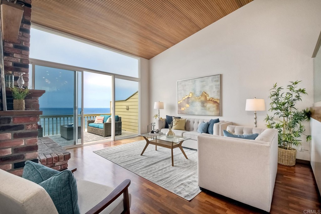 1808 Parliament Road Encinitas, CA 92024 - Photo 14 of 49 a living room with furniture and a large window