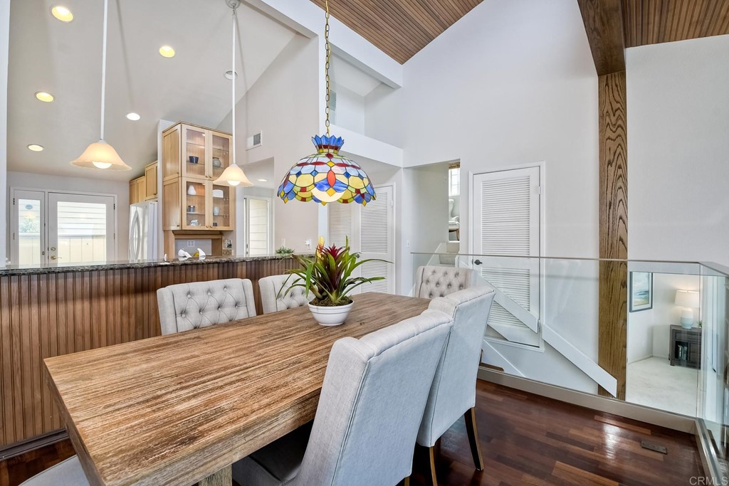 1808 Parliament Road Encinitas, CA 92024 - Photo 20 of 49 a view of a dining room with furniture and wooden floor