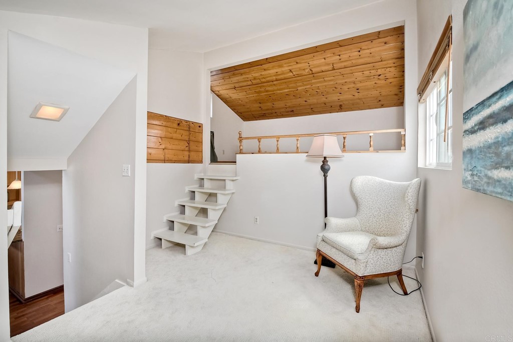 1808 Parliament Road Encinitas, CA 92024 - Photo 34 of 49 a living room with furniture and a window