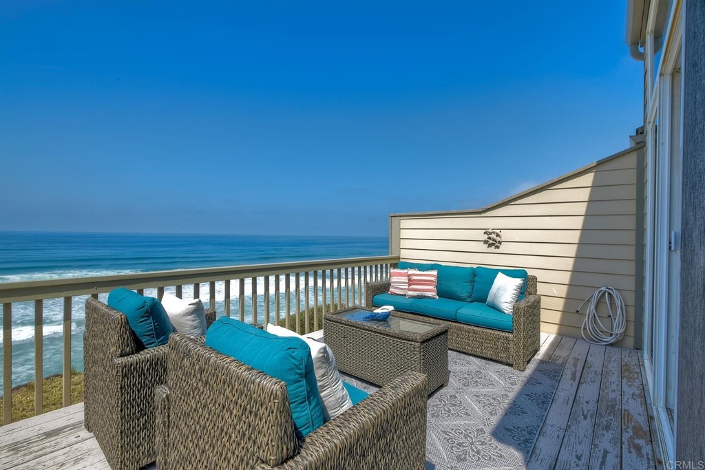 1808 Parliament Road Encinitas, CA 92024 - Photo 38 of 49 a balcony with couch and wooden floor