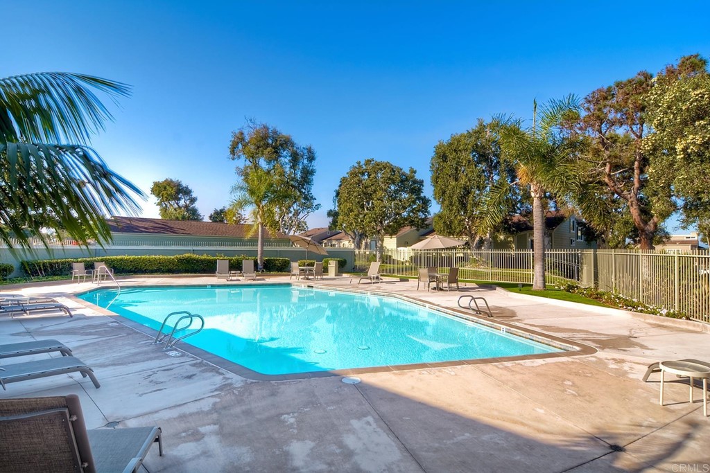 1808 Parliament Road Encinitas, CA 92024 - Photo 48 of 49 a view of a swimming pool with an outdoor space and seating area