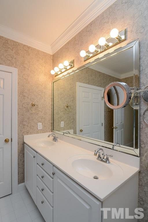 3504 Proprietor Way Raleigh, NC 27612 - Photo 17 of 25 a bathroom with a double vanity sink and a mirror