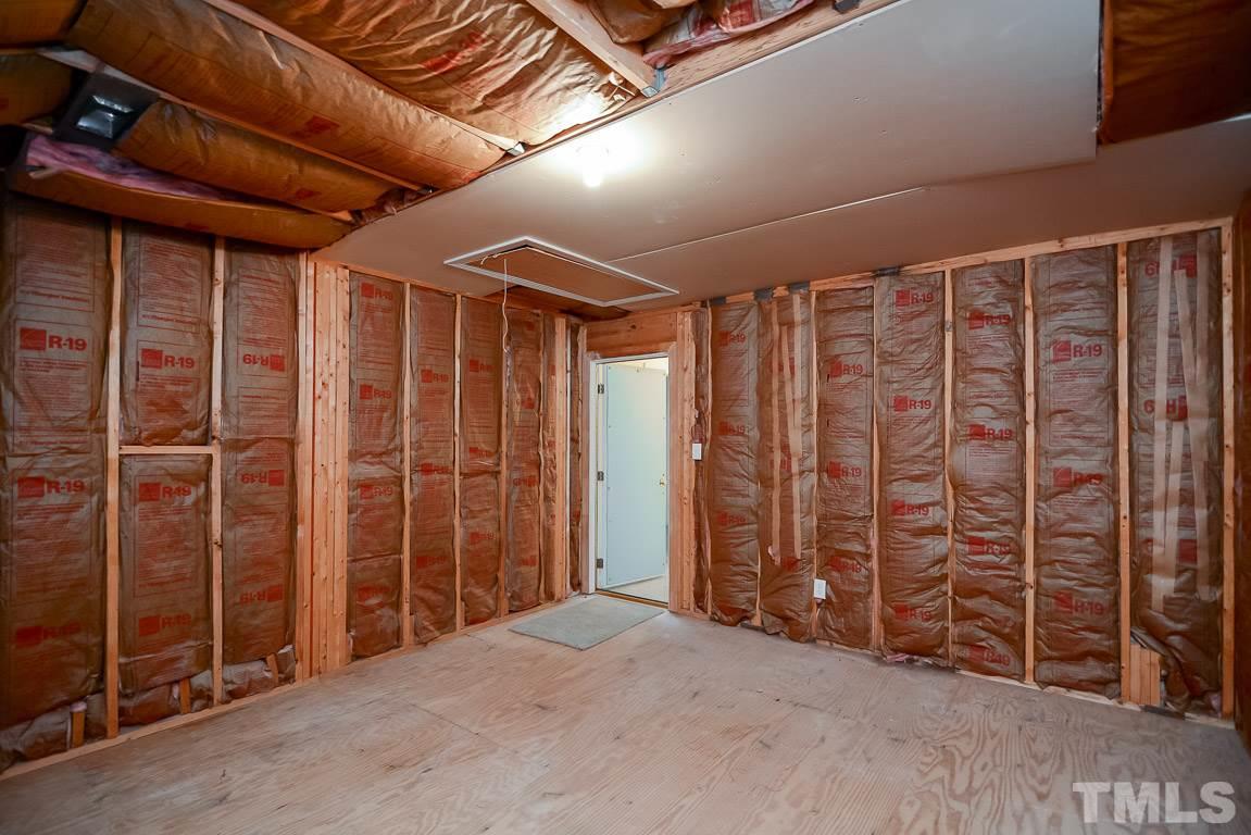 3504 Proprietor Way Raleigh, NC 27612 - Photo 22 of 25 a view of empty room with wooden walls