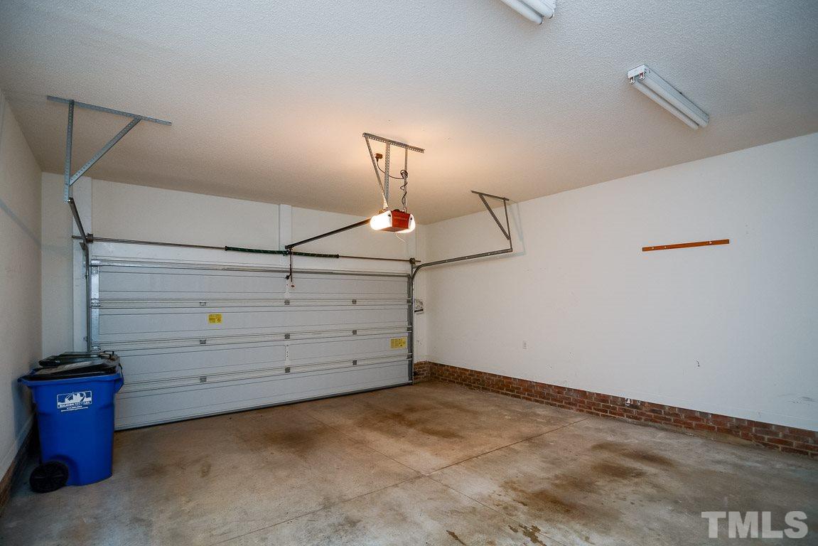3504 Proprietor Way Raleigh, NC 27612 - Photo 8 of 25 a view of a room with cabinets and wooden floor