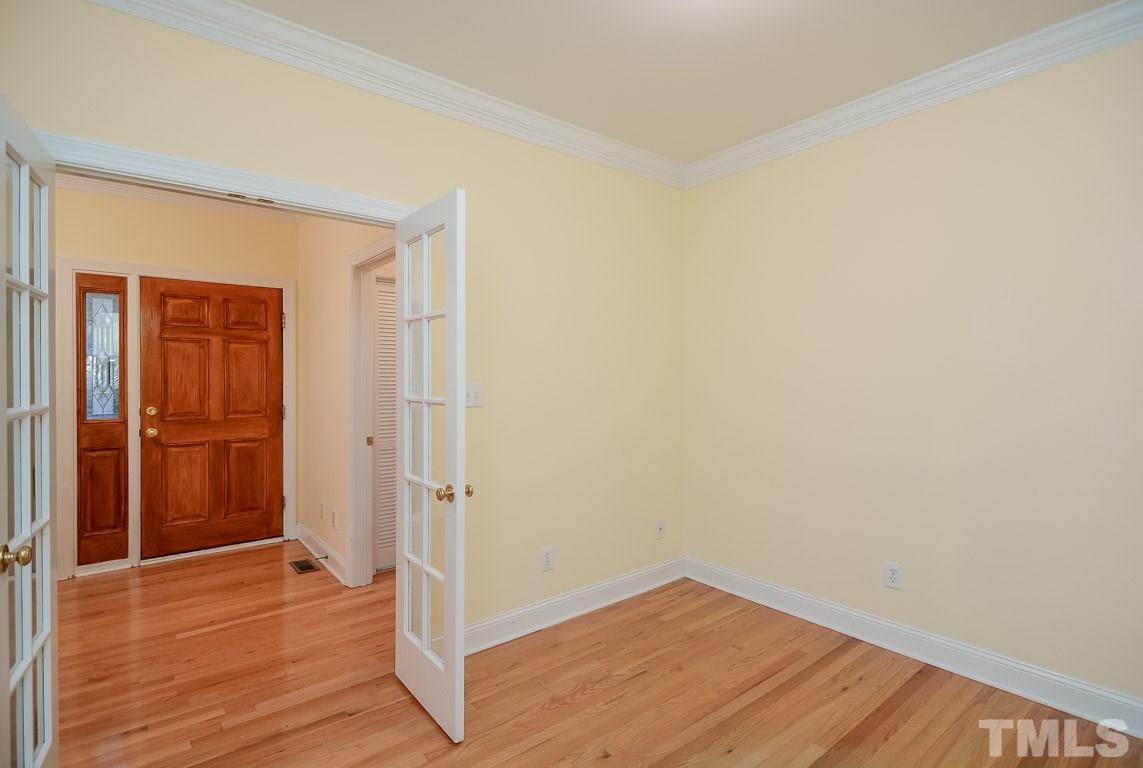 3504 Proprietor Way Raleigh, NC 27612 - Photo 9 of 25 a view of a hallway with wooden floor and closet
