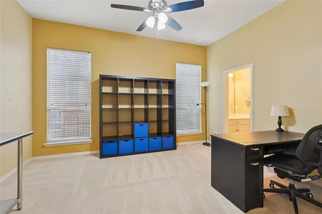 a view of a livingroom with a workspace