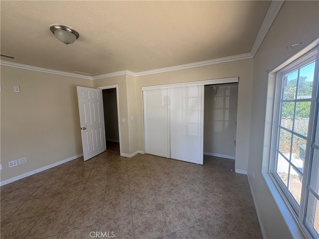 3395 Franklin Avenue Riverside, CA 92507 - Photo 22 of 55 a view of an empty room with a window