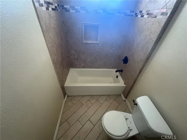 a bathroom with a sink and toilet