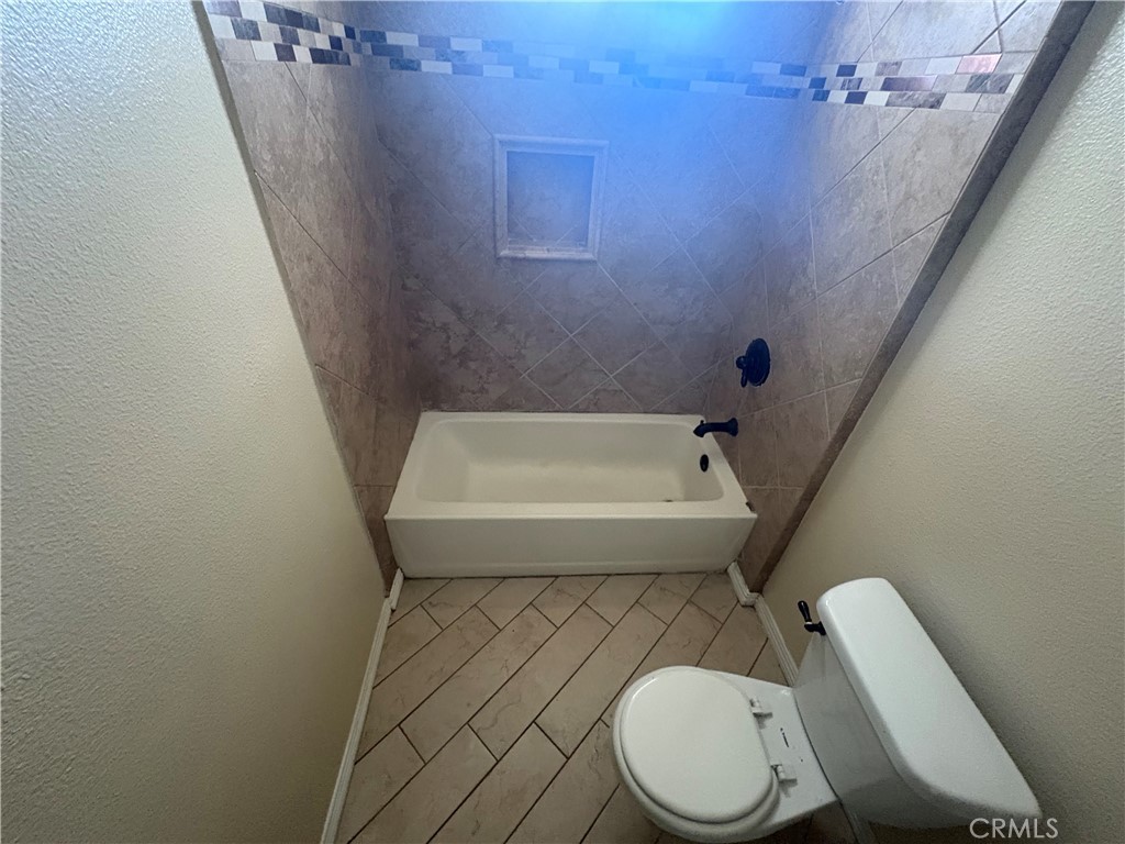 3395 Franklin Avenue Riverside, CA 92507 - Photo 25 of 55 a bathroom with a sink and toilet