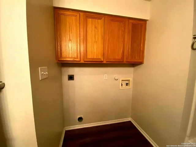 a view of room with wooden floor