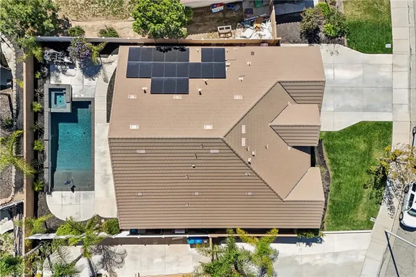 an aerial view of multiple houses with outdoor space