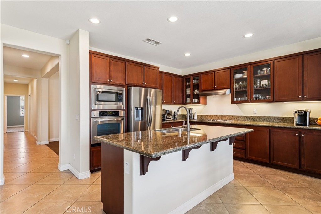28552 Rustic Glen Street Menifee, CA 92584 - Photo 8 of 48 Open kitchen with generous counter space