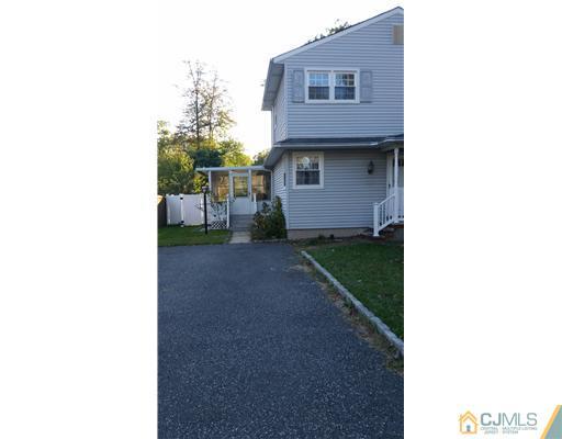 626 Spruce Road North Brunswick, NJ 08902 - Photo 13 of 23 a view of a house with a yard