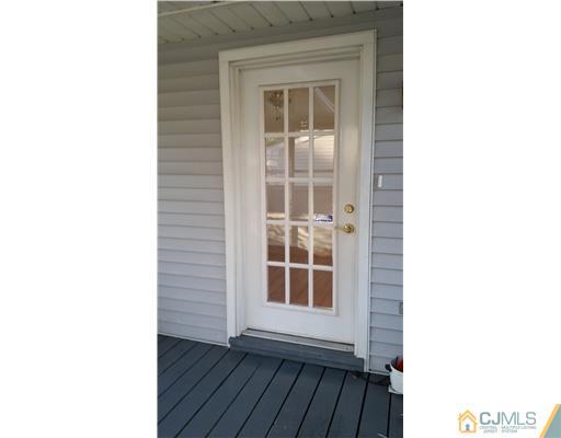 626 Spruce Road North Brunswick, NJ 08902 - Photo 21 of 23 a view of a room that has a window in it
