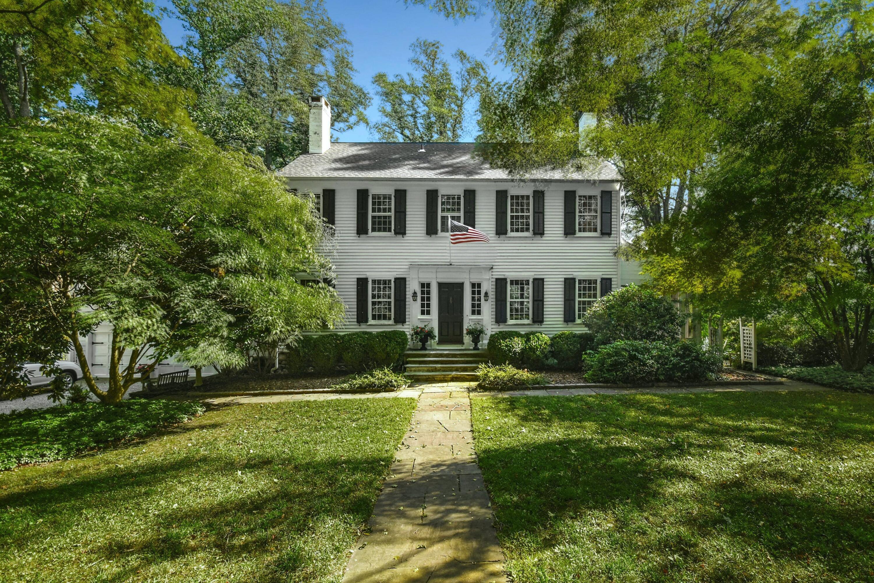 162 Marshall Ridge Road New Canaan, CT 06840 - Photo 1 of 29 a front view of a house with a yard