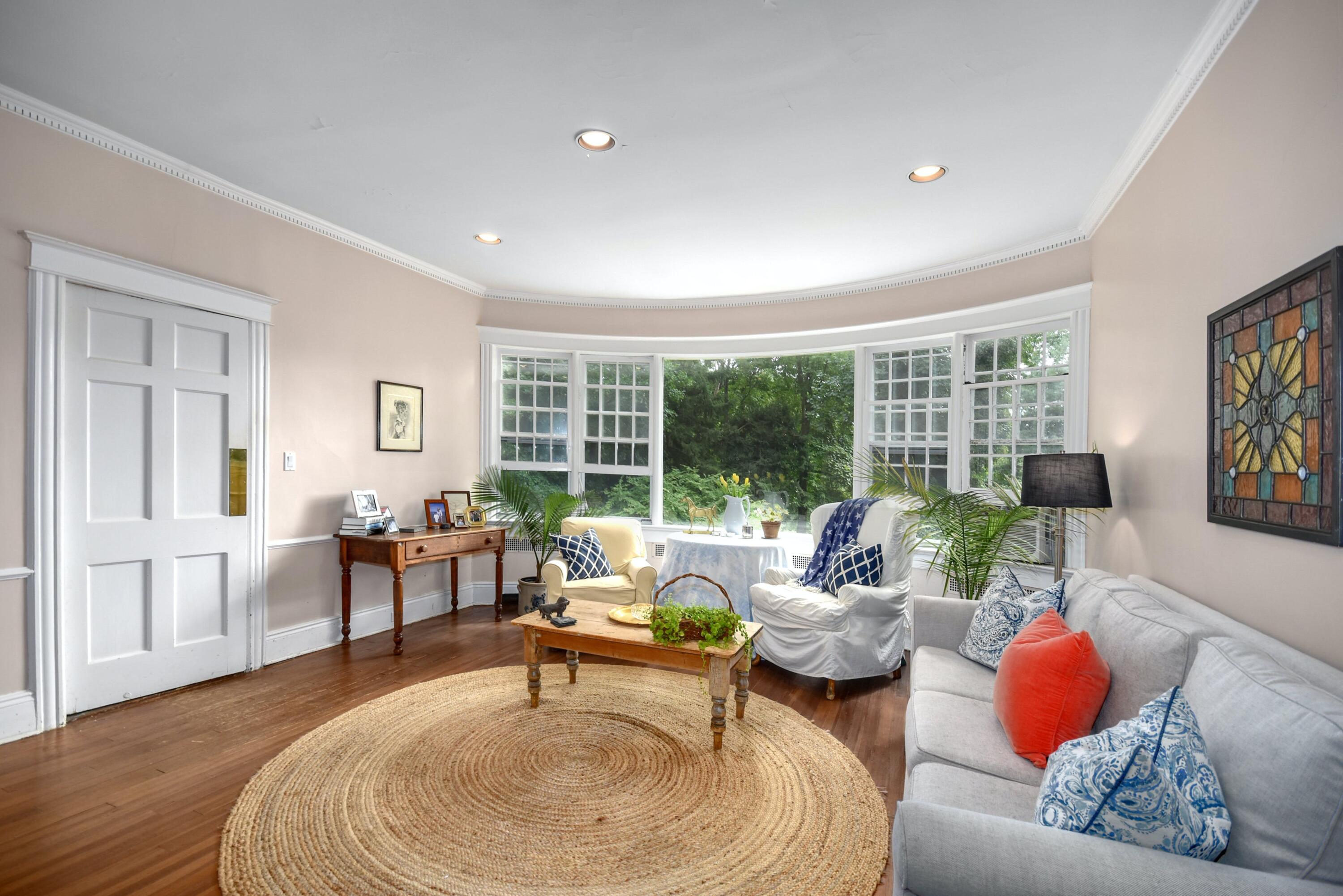 162 Marshall Ridge Road New Canaan, CT 06840 - Photo 14 of 29 a living room with furniture and a large window