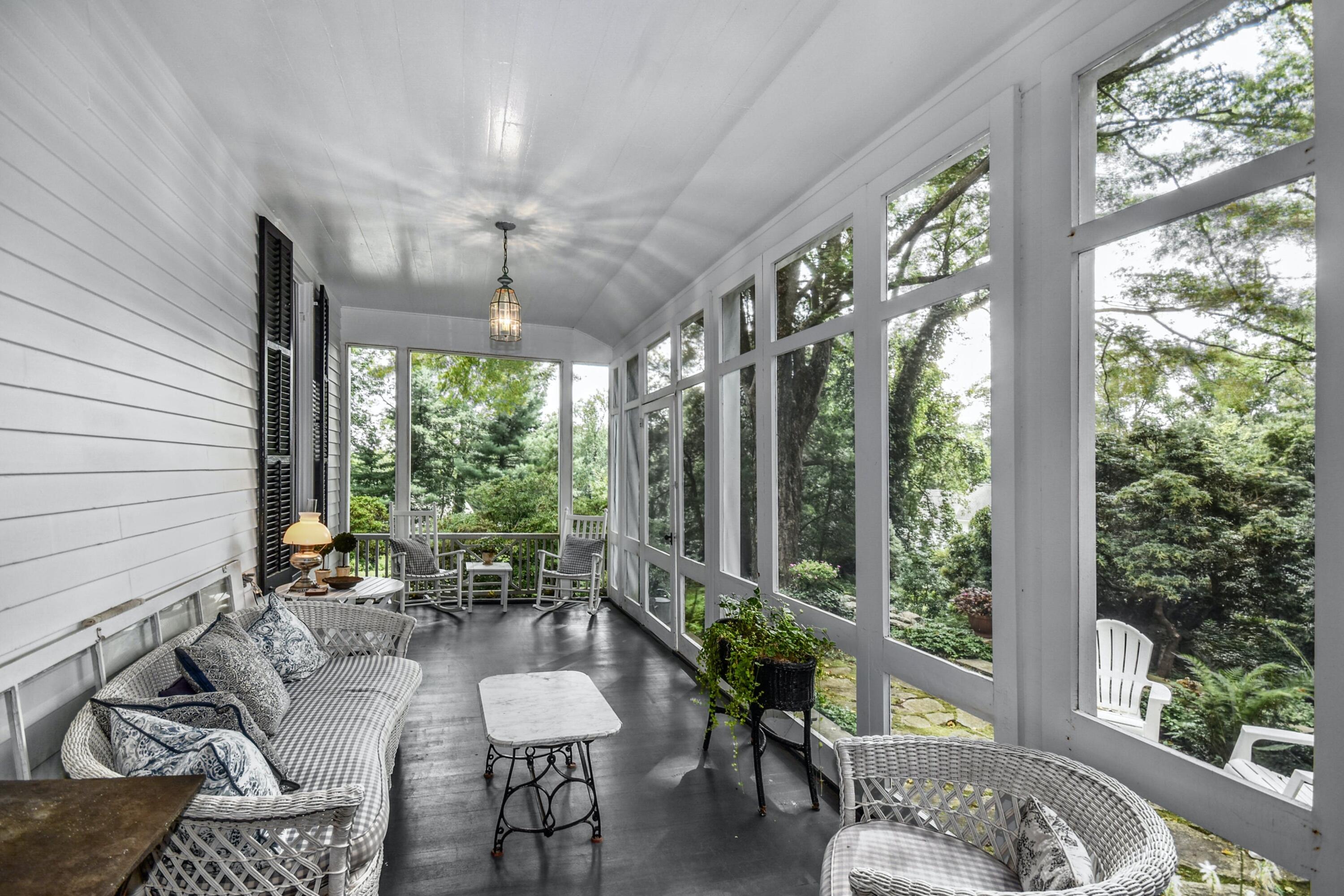 162 Marshall Ridge Road New Canaan, CT 06840 - Photo 19 of 29 a living room with furniture and garden view