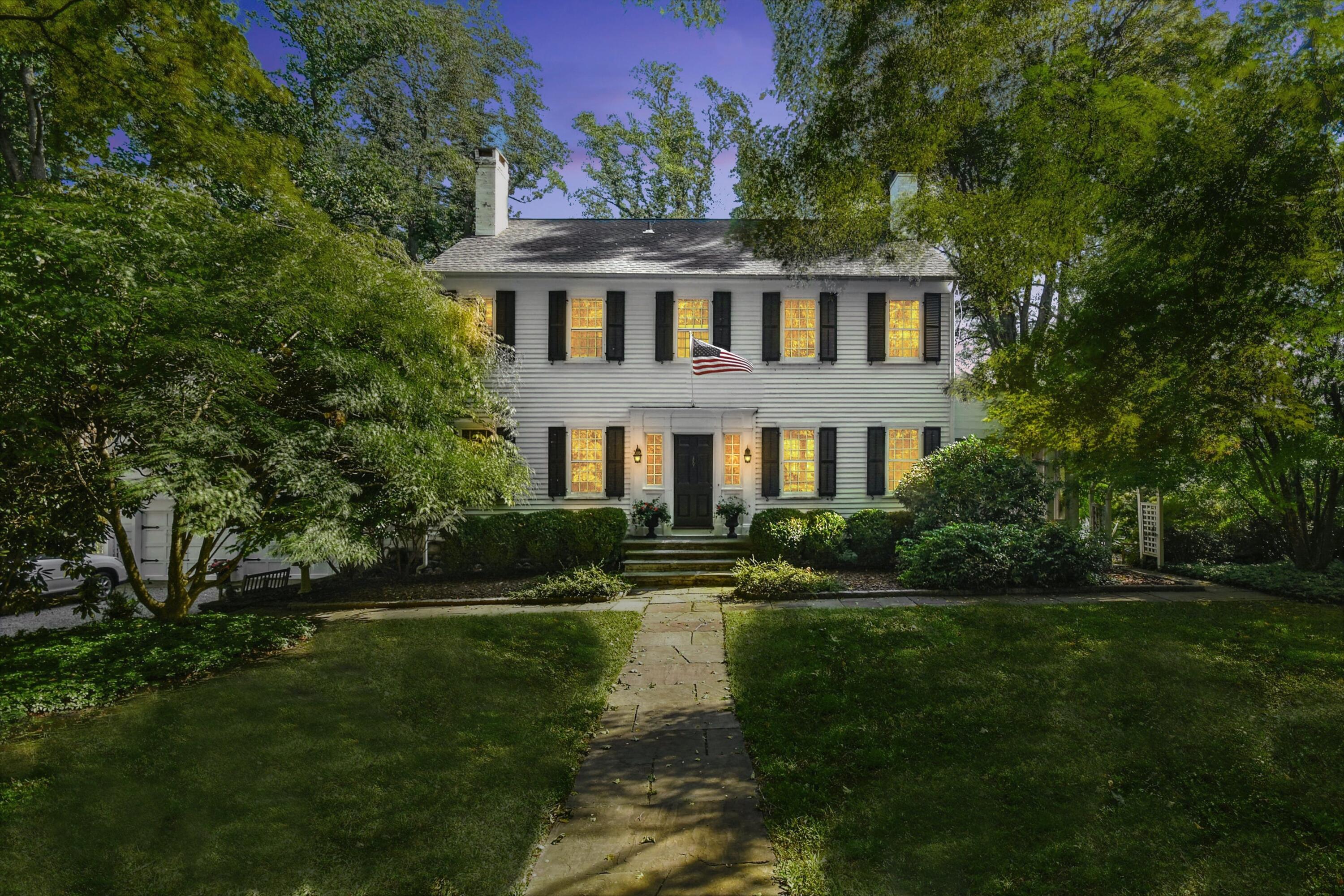 162 Marshall Ridge Road New Canaan, CT 06840 - Photo 27 of 29 a front view of a house with a yard and lake view