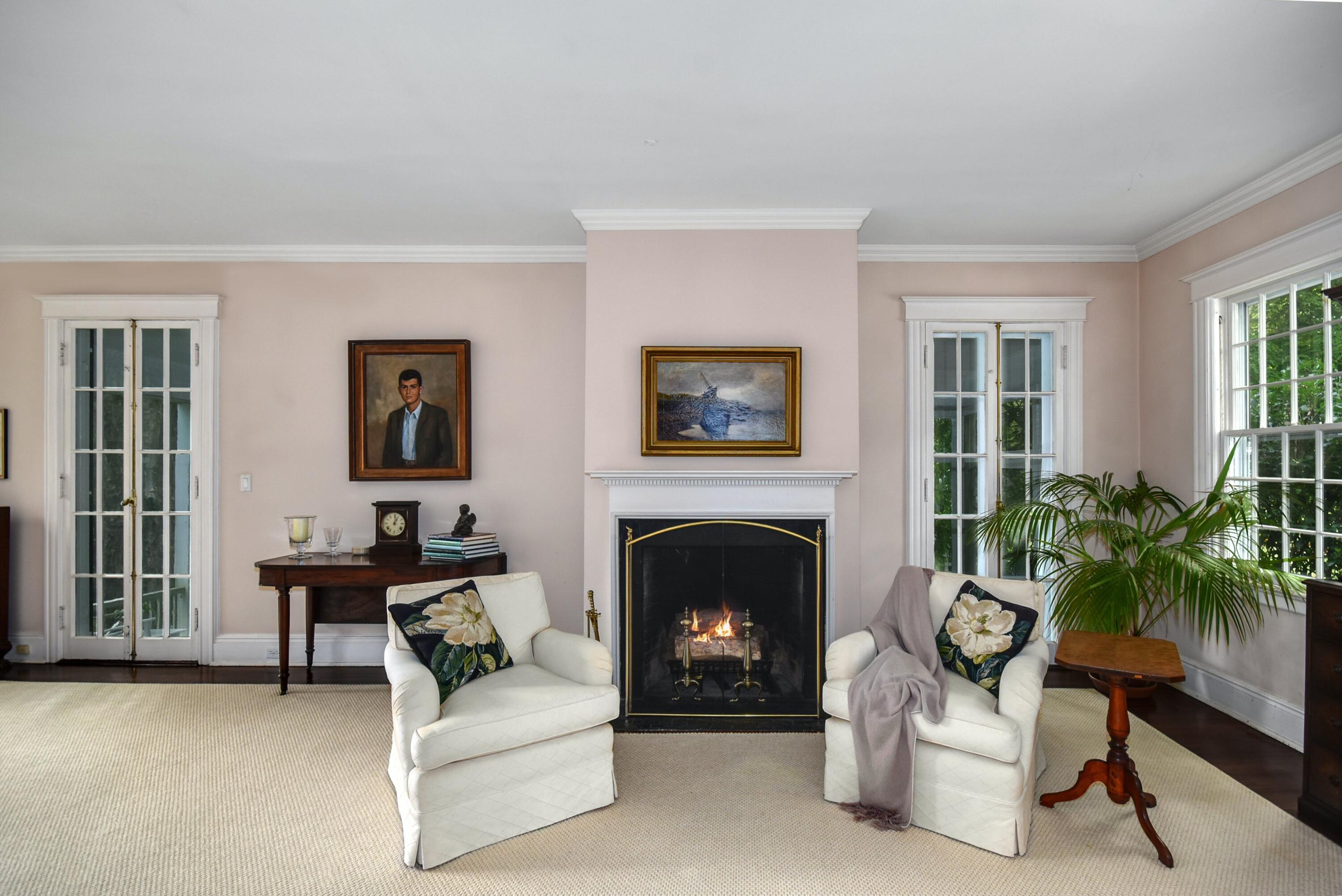 162 Marshall Ridge Road New Canaan, CT 06840 - Photo 6 of 29 a living room with furniture and a fireplace