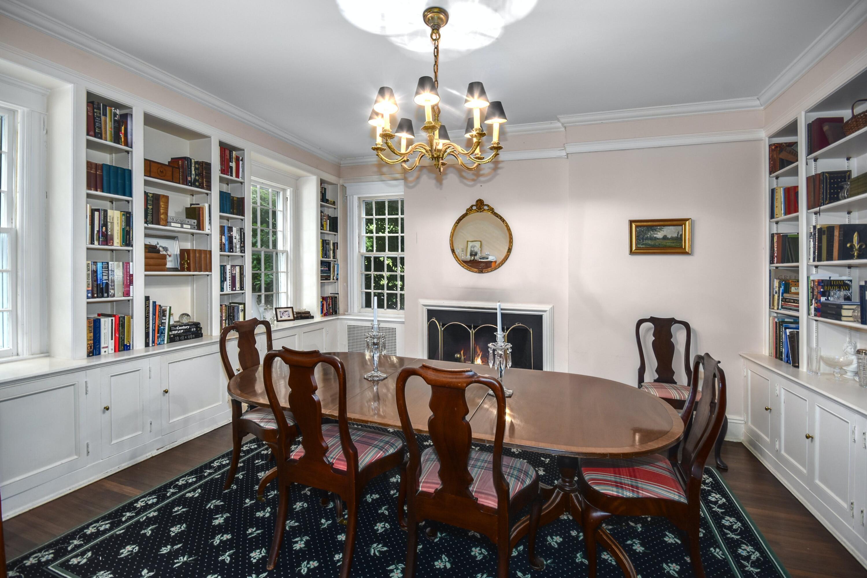 162 Marshall Ridge Road New Canaan, CT 06840 - Photo 10 of 29 a view of a dining room with furniture and a chandelier