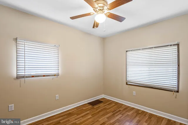 a view of a room that has a window in it