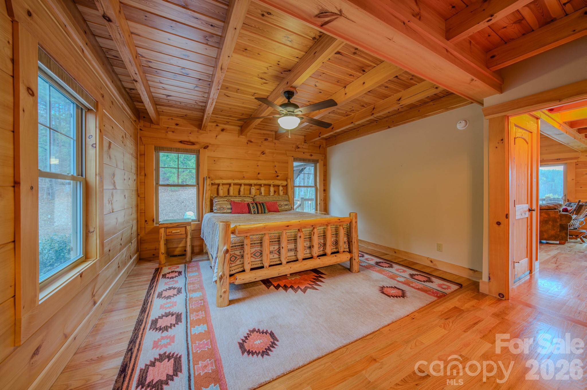 9147 Shortoff View Terrace Nebo, NC 28761 - Photo 18 of 48 a bedroom with furniture and a rug