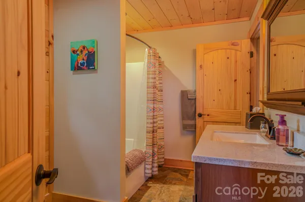 a view of a chairs and table in a patio