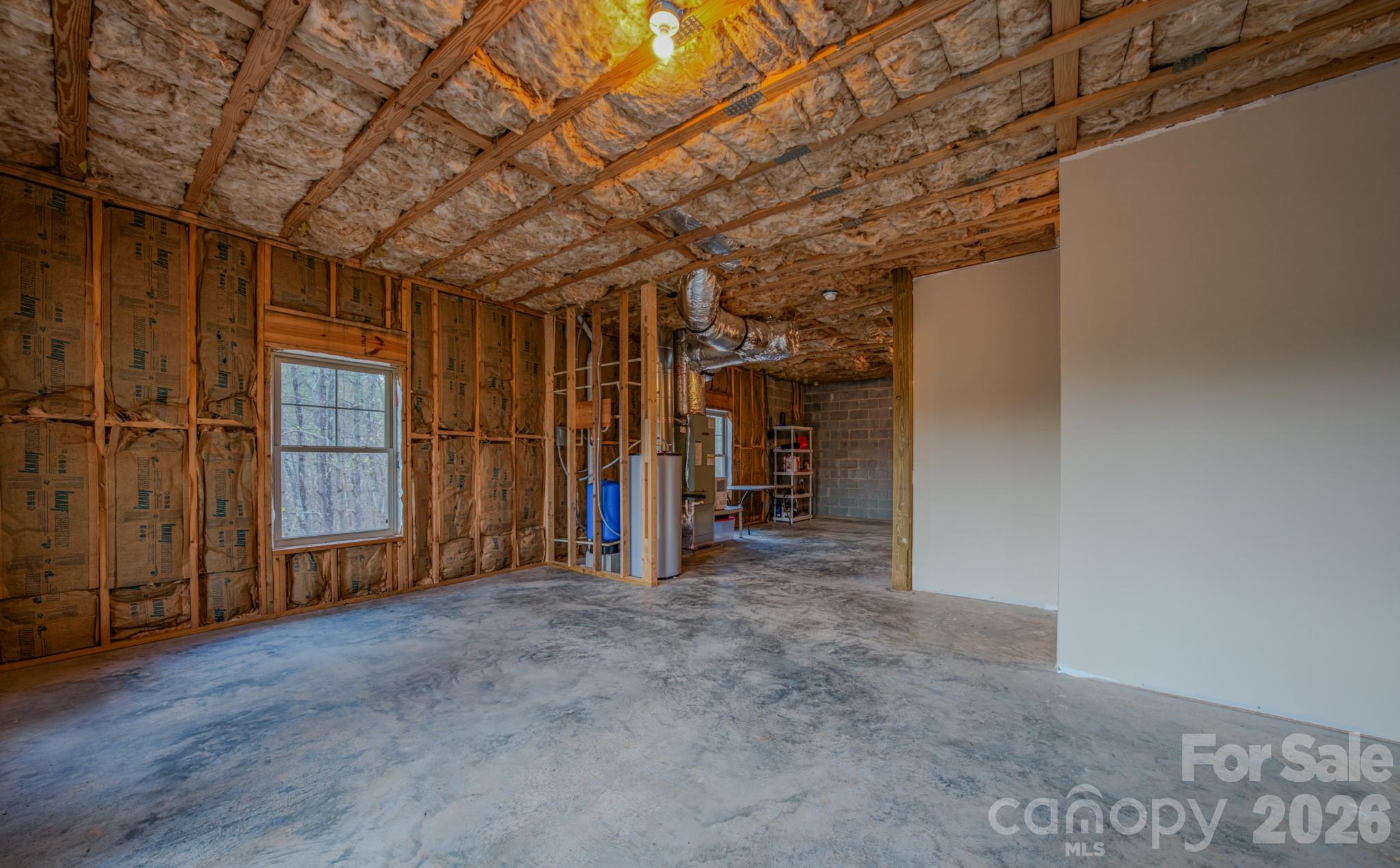 9147 Shortoff View Terrace Nebo, NC 28761 - Photo 28 of 48 a view of empty room with wooden walls