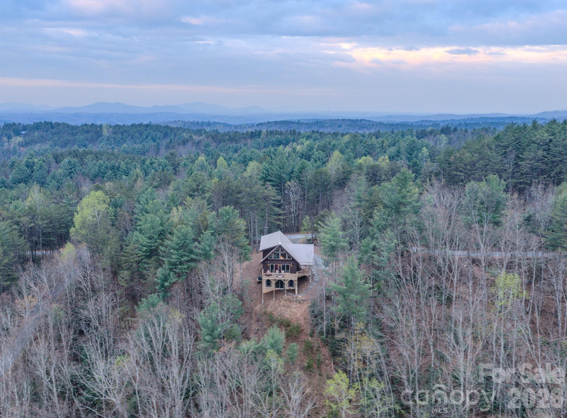 9147 Shortoff View Terrace Nebo, NC 28761 - Photo 32 of 48 a view of a lush green field