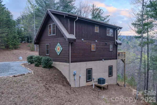 a view of a dry yard with an outdoor space and covered view