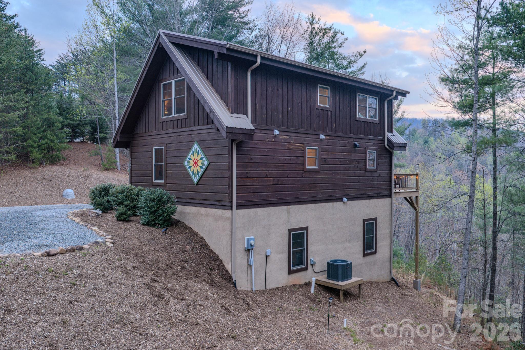 9147 Shortoff View Terrace Nebo, NC 28761 - Photo 34 of 48 a view of a house with a yard