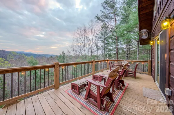 a view of balcony with furniture