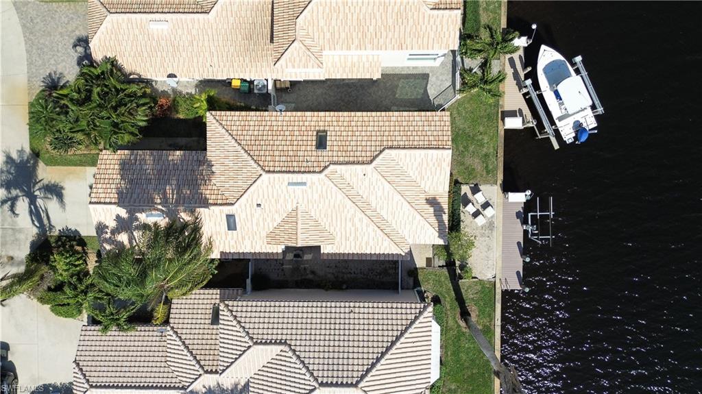 162 Eveningstar Cay Naples, FL 34114 - Photo 25 of 32 a view of entryway with wooden floor