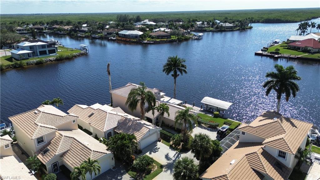 162 Eveningstar Cay Naples, FL 34114 - Photo 27 of 32 an aerial view of a house with outdoor space