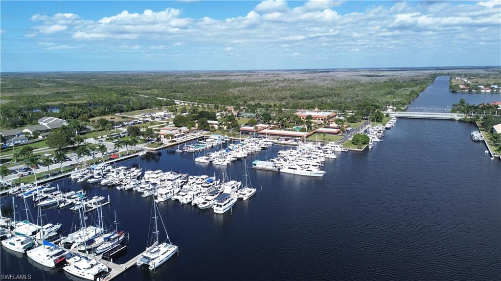 162 Eveningstar Cay Naples, FL 34114 - Photo 31 of 32 an aerial view of a house with a ocean view
