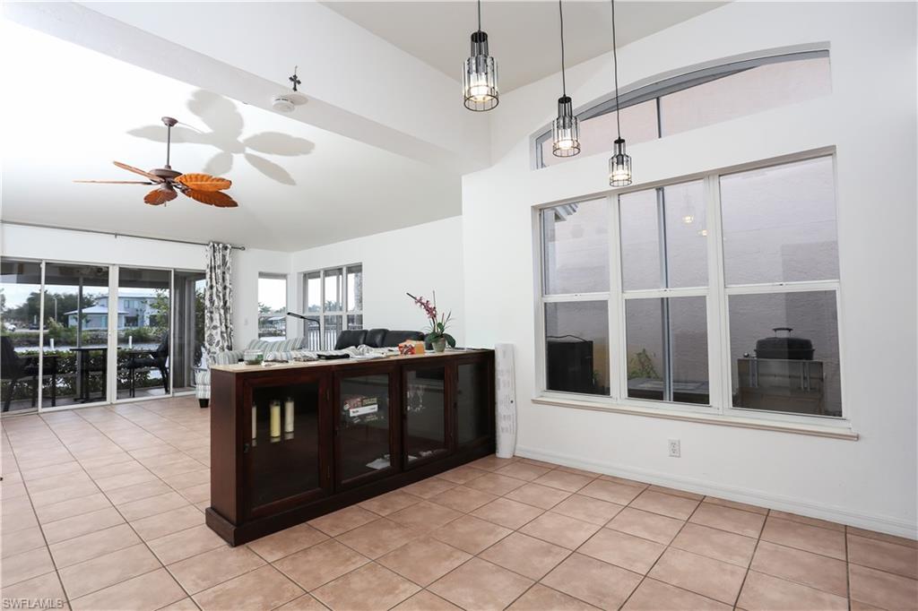 162 Eveningstar Cay Naples, FL 34114 - Photo 10 of 32 a view of a room with windows