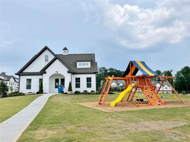 a view of a house with a big yard