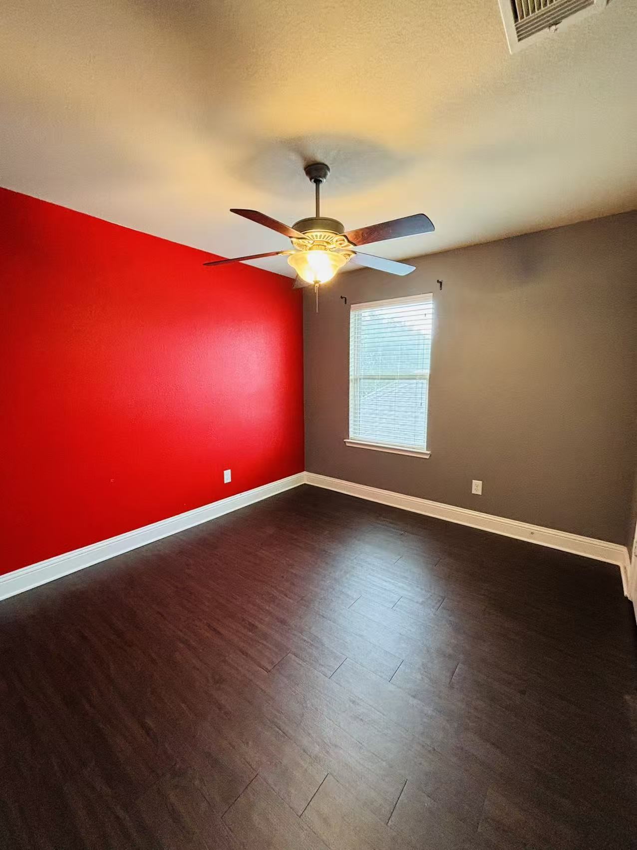 419 Blossom Terrace Lane Rosenberg, TX 77469 - Photo 11 of 19 an empty room with windows and fan