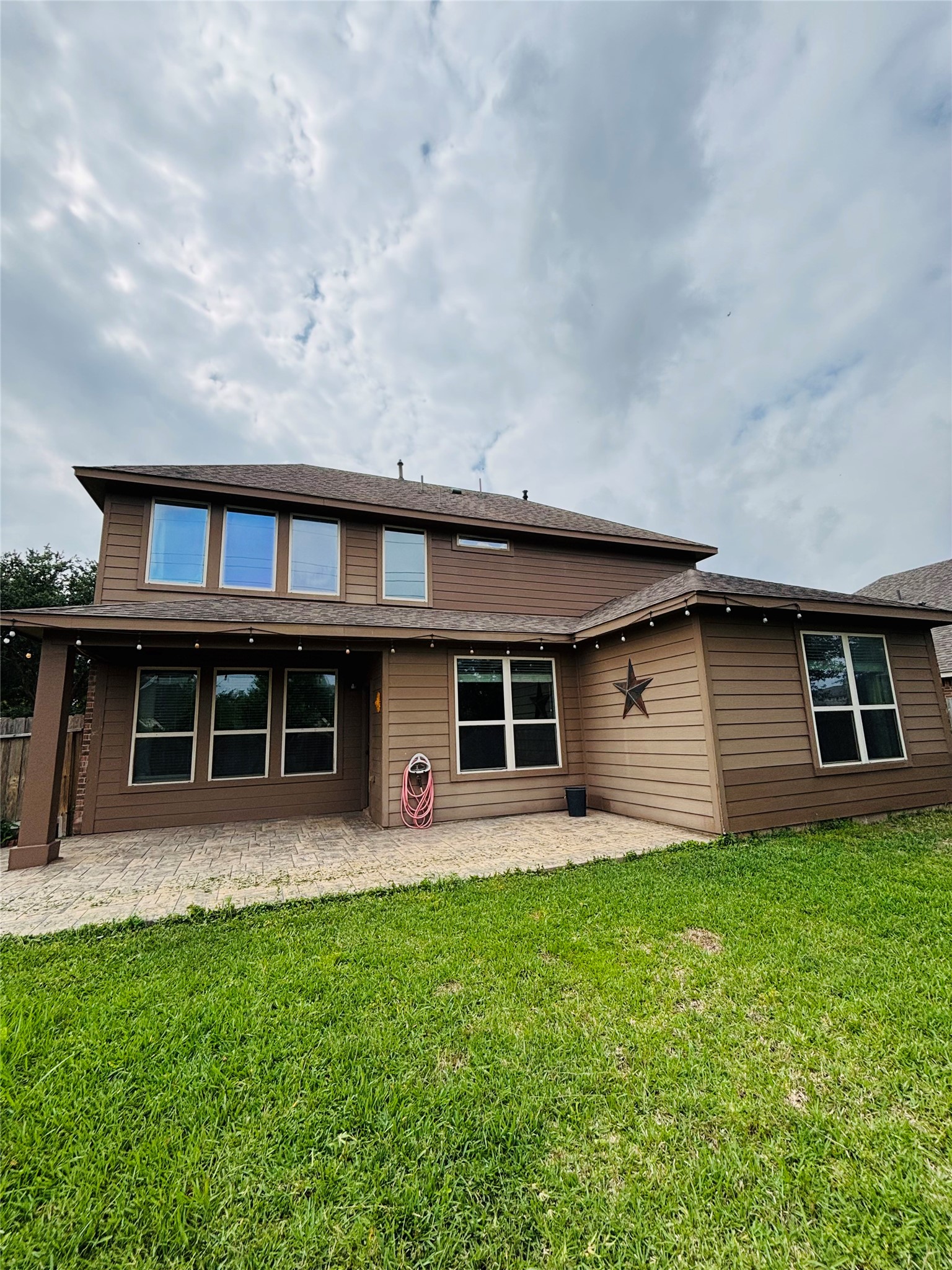 419 Blossom Terrace Lane Rosenberg, TX 77469 - Photo 18 of 19 front view of a house with a yard