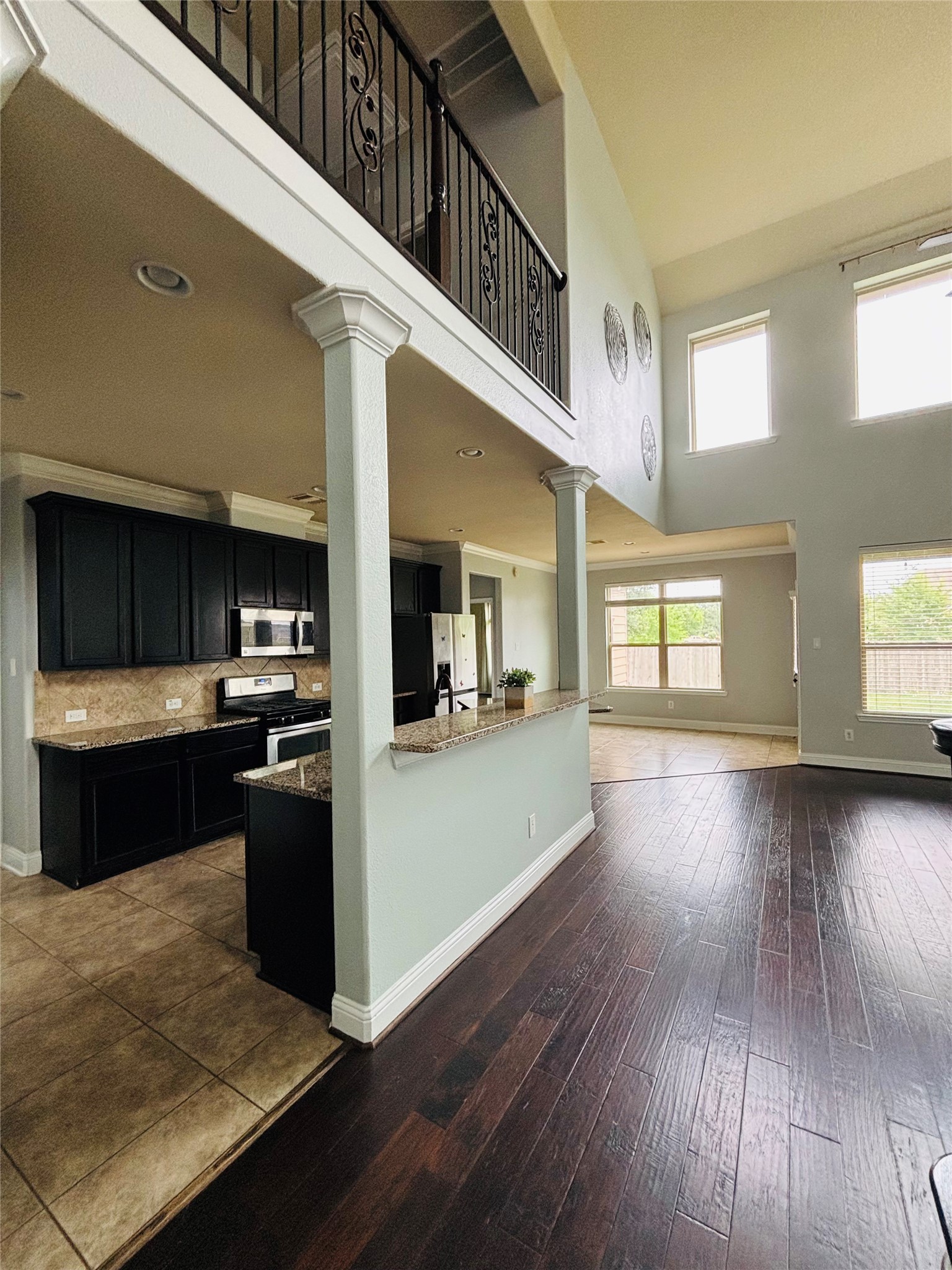 419 Blossom Terrace Lane Rosenberg, TX 77469 - Photo 5 of 19 a view of kitchen with cabinets and wooden floor
